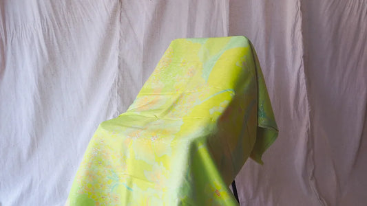 Hand-woven silk, batik painting, shades of light banana leaf green. Sold by the yard, code A11-CT-102081