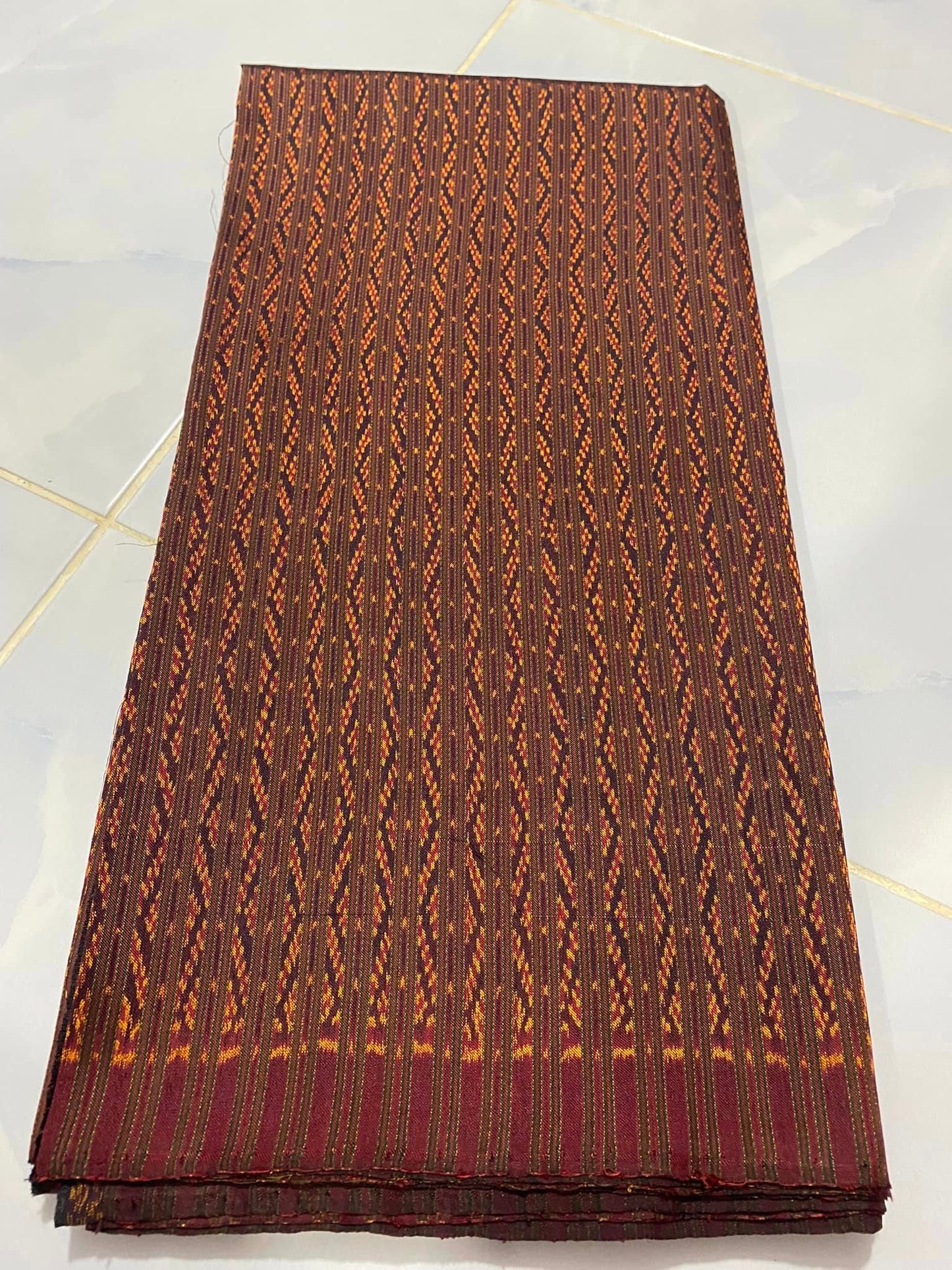 Mudmee silk sarong, 3 takor, size 1x2 meters, Hole Prae Khanong pattern, reddish brown, code R1A-RT-06306700