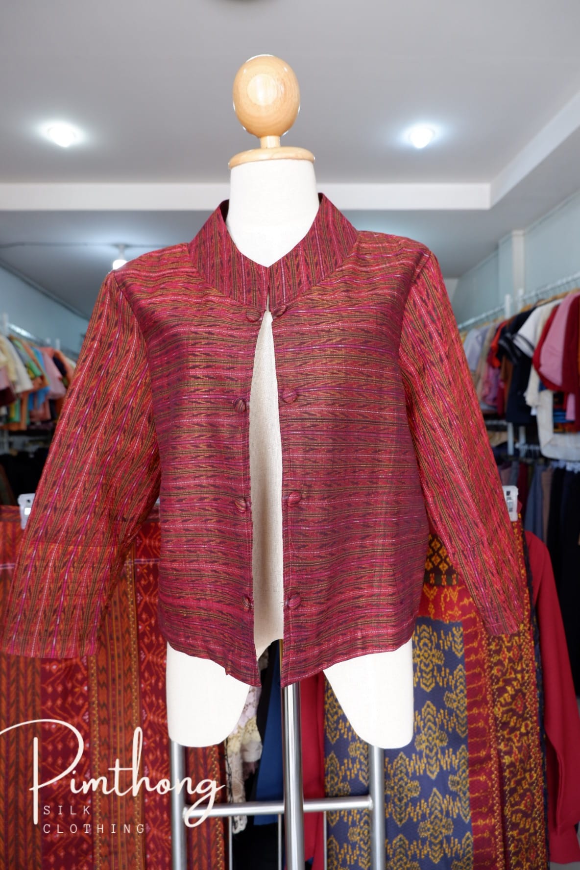 Women's shirt, quarter length sleeves, size 38-40-42, hole pattern, red background, code WD-PTS0711662.