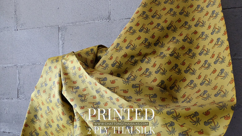 2 strands of printed silk, shades of yellow, sold by the yard, code A4-CT-SKU100292