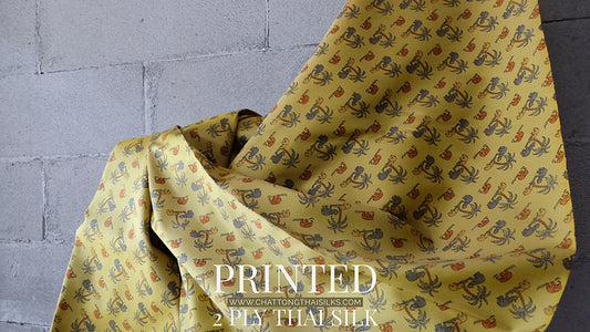 2 strands of printed silk, shades of yellow, sold by the yard, code A4-CT-SKU100292