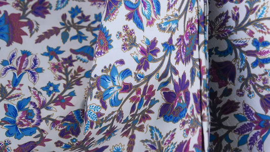 2 strands of printed silk, shades of white, blue, purple. Sold by the yard, code A4-CT-SKU102075