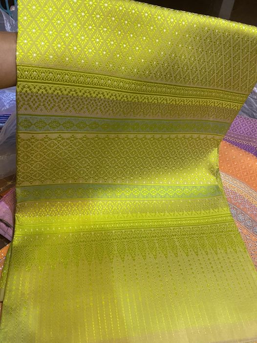 Surin silk skirt, real silk, size 1x2 meters, Pupid pattern, light green banana leaf background. Koh Choeng Din Thong, code N11-PM0515661