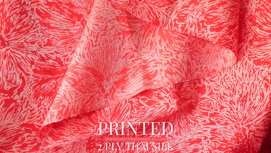 2 strands of printed silk, shades of red and pink. Sold by the yard, code A4-CT-SKU100294