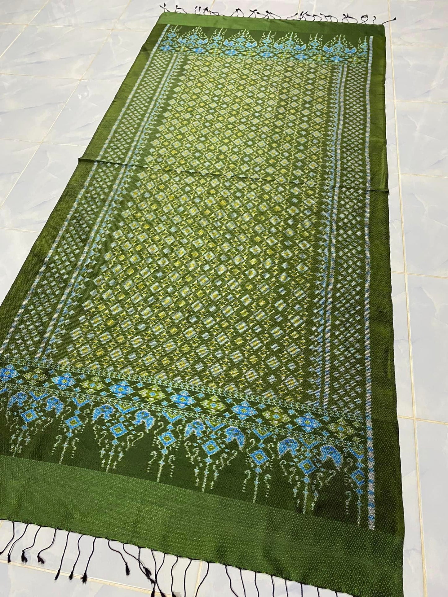 Mudmee silk sarong, woven with 6 tassels, has a frilly front, size 1x2 meters, green background, code L9A-RT-0623672214